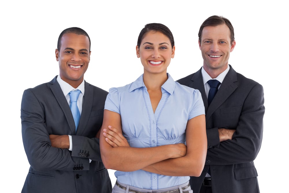Small group of smiling business people standing together on white background Small group of smiling business people standing together on white background