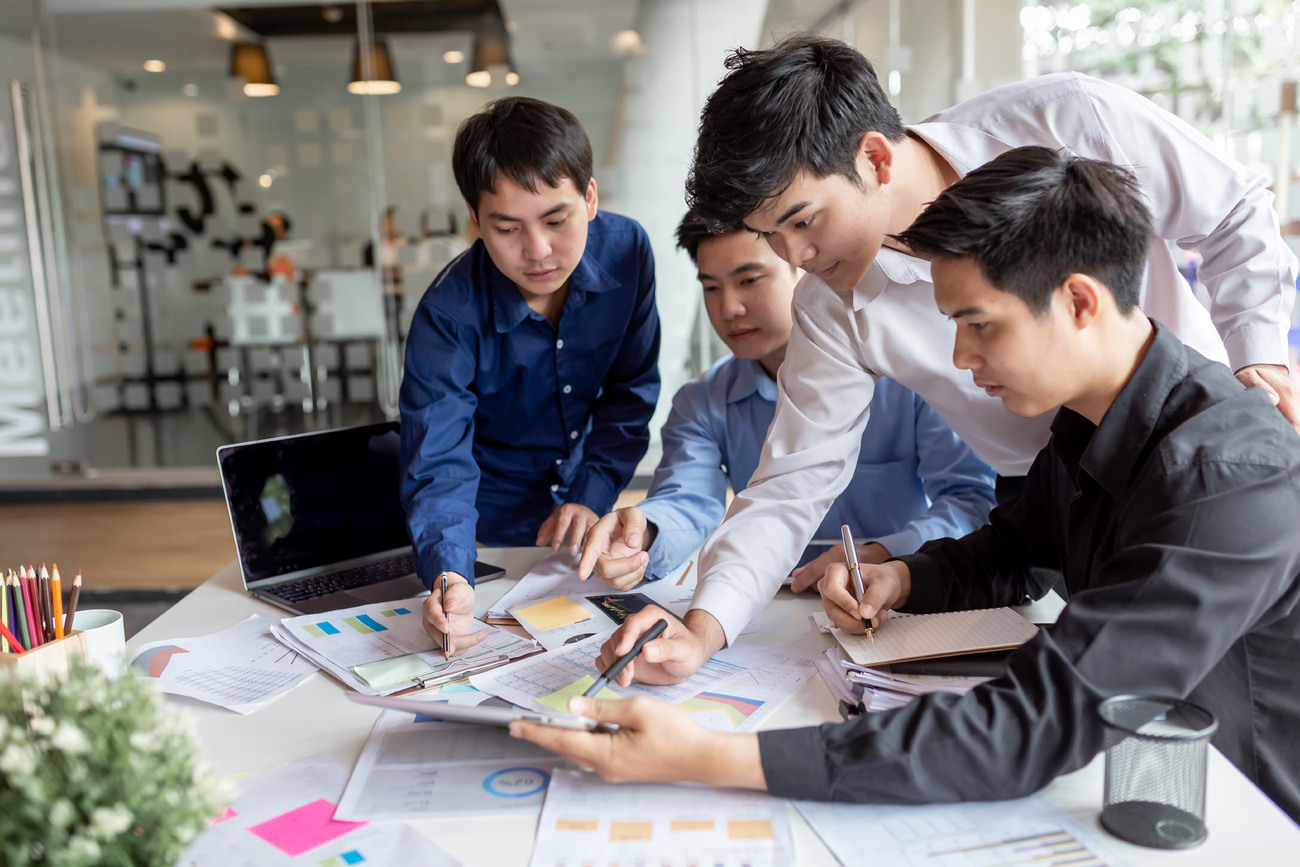 group-of-creative-young-business-men-brainstorming-2023-11-27-04-50-03-utc-1